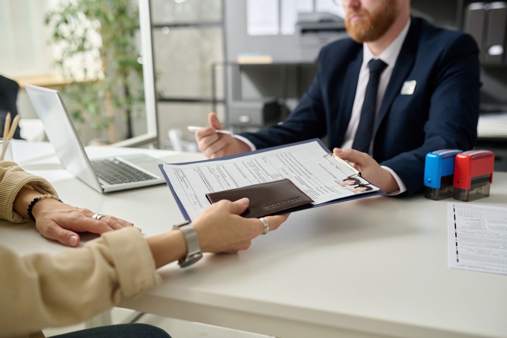 Woman applying for visa in US immigration office